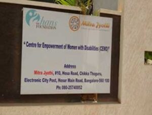 A sign board on the side of a building.