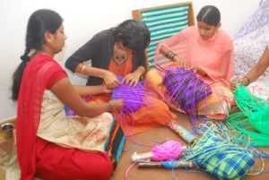 Basic craft work like sewing, basket making, envelope making and handicraft work training program at Mitra Jyothi.