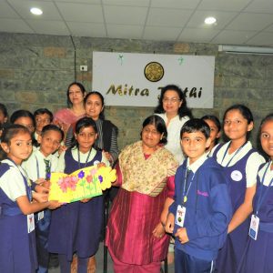 Students from Samsidh Mount Litera Zee School, HSR, at Mitra Jyothi presenting flowers to Madhu Singhal.