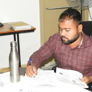 Image of person verifying documents