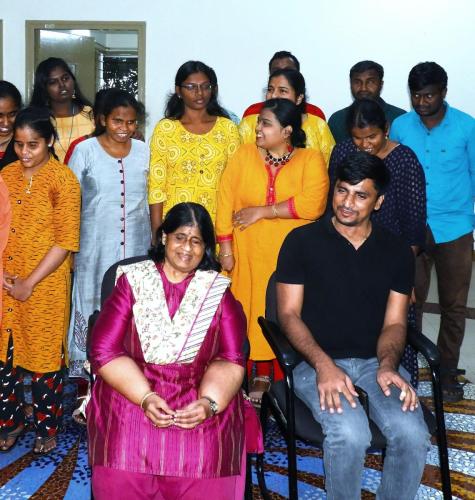Ms. Madhu Singhal and Mr. Satender Singh, Deputy Collector of Puducherry, with a group of people.
