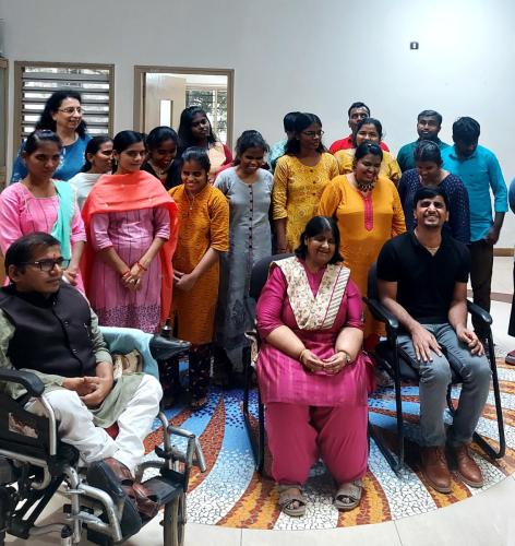 Ms. Madhu Singhal and Mr. Satender Singh, Deputy Collector of Puducherry, with a group of people.