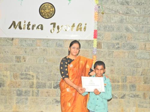 Students reciving Certificate on 56th Digital Literacy Batch - Valedictory Function at Mitra Jyothi.