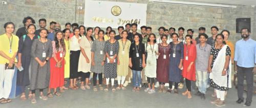 A group photo with students from Don Bosco Arts and Science College, Angadi Kadavu.