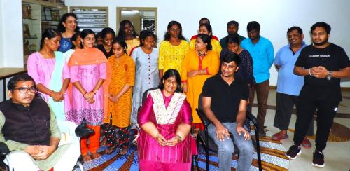Ms. Madhu Singhal and Mr. Satender Singh, Deputy Collector of Puducherry, with a group of people.
