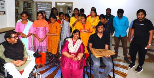 Ms. Madhu Singhal and Mr. Satender Singh, Deputy Collector of Puducherry, with a group of people.