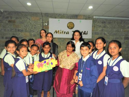 Students from Samsidh Mount Litera Zee School, HSR, at Mitra Jyothi presenting flowers to Madhu Singhal.