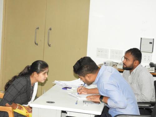 A student verifying her documents