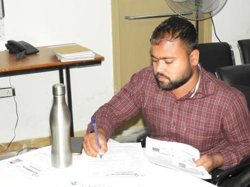 Image of person verifying documents