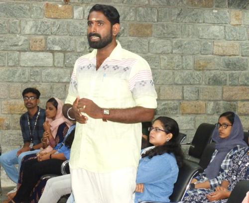 Members of the Kerala Federation of the Blind, Thiruvananthapuram, giving a speech.