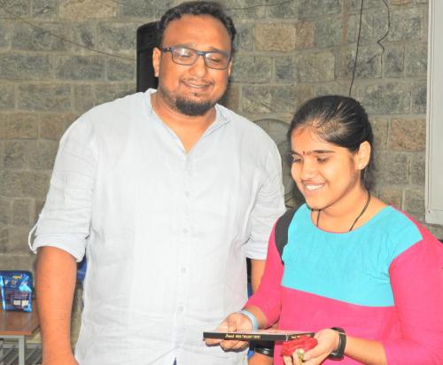 Students receiving gifts during GAAD Event Celebrations at Mitra Jyothi.