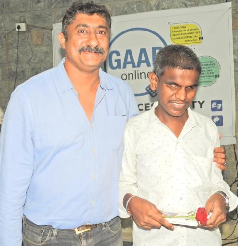 Students receiving gifts during GAAD Event Celebrations at Mitra Jyothi.